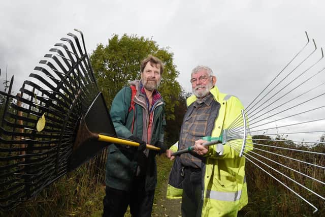 Grimsargh Wetlands trustees Mike Fisher, left, and Geoff Carefoot, joined volunteers from Ribble Rivers Trust at the willow cutting and bundling event at Grimsargh Wetlands