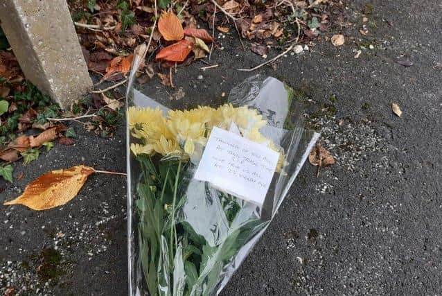 Flowers at the scene of the explosion in Kirkby Avenue.