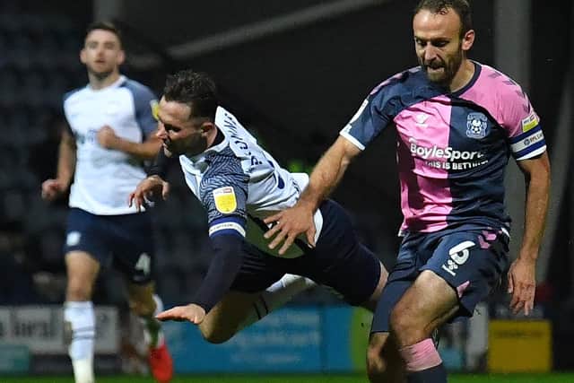 PNE skipper Alan Browne is tripped by Coventry's Liam Kelly