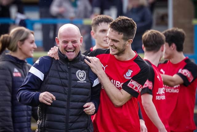 Boss Jamie Milligan shares a joke with Matt Dudley following the win over Stalybridge Celtic (Photo:Ruth Hornby)