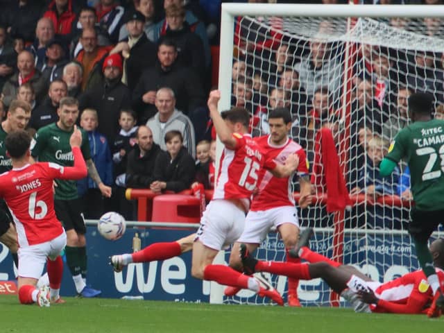 Anthony O'Connor (centre) was praised by Morecambe boss Stephen Robinson