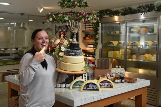 Laura Barnes, Technical  Manager at Dewlay says cheese to celebrate their awards at the International Cheese and Dairy Awards          Photo: Neil Cross