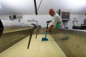 Head Cheesemaker Alan Townsend at work at Leagram Organic Dairy  Photo: Neil Cross