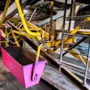 A pink bucket from the aerial ropeway which runs between Forterra’s quarry and its factory in Claughton, near Lancaster. The buckets were painted pink for Breast Cancer Now’s Wear it Pink Day, raising money and awareness for breast cancer research