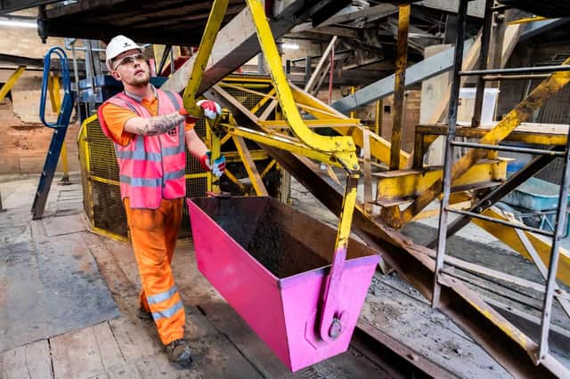 A pink bucket from the aerial ropeway which runs between Forterra’s quarry and its factory in Claughton, near Lancaster. The buckets were painted pink for Breast Cancer Now’s Wear it Pink Day, raising money and awareness for breast cancer research