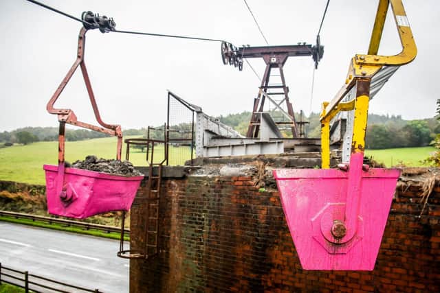 Business turns its historic Lancashire landmark pink for breast cancer ...