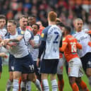 The two sets of players clashed towards the end of Saturday's derby