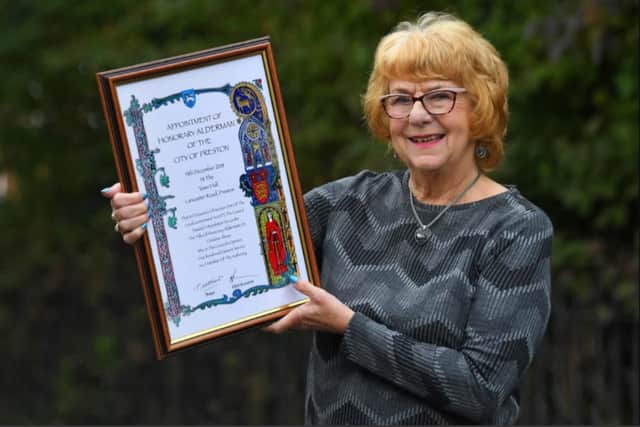 Christine Abram with her Honorary Alderman certificate.