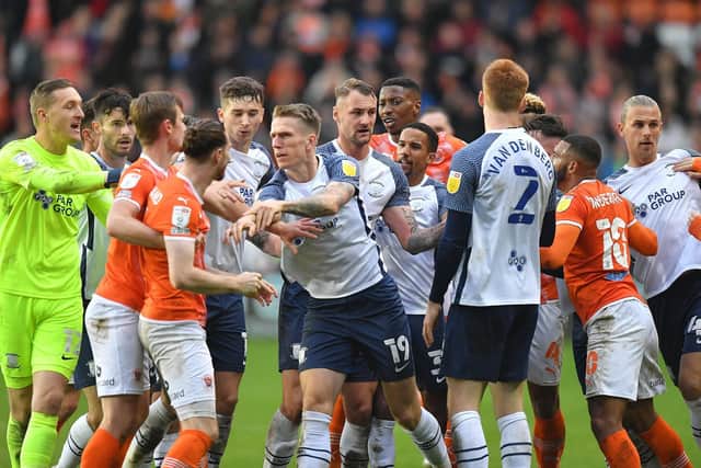 Preston North End and Blackpool players get involved in a melee at Bloomfield Road