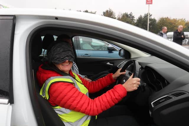Sight Loss Advisor Adele Dewhurst driving blindfolded