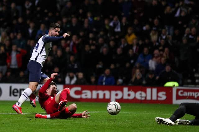 Preston North End striker Sean Maguire sees a shot saved by Liverpool keeper Adrian