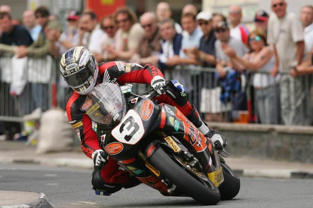 RAMSEY, ISLE OF MAN - JUNE 08:  John McGuinness in action during the senior race in the Isle of Man TT (Tourist Trophy) Races on June 8, 2007 in Isle of Man.  (Photo by Ian Walton/Getty Images)