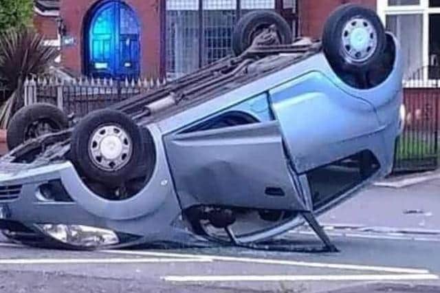 The driver was taken to hospital after a car crashed and flipped onto its roof in Blackpool Road on Thursday (October 28). Picture credit: Ashton & PR2 Community Group