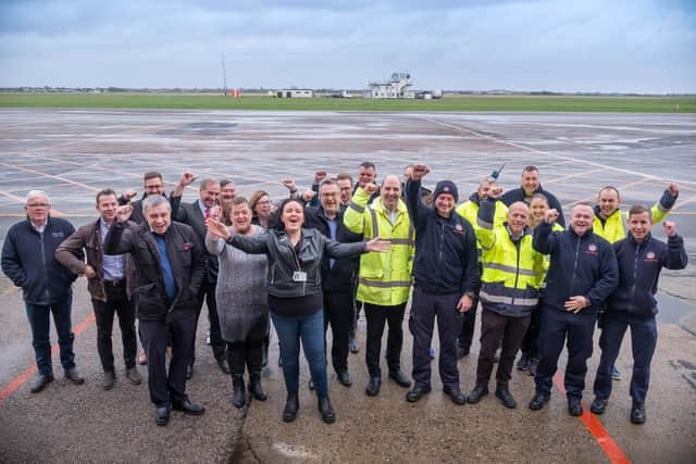 Staff at Blackpool Airport celebrate the handing over of the operating licences to Blackpool Airport Operations Limited, a wholly-owned subsidiary of Blackpool Council