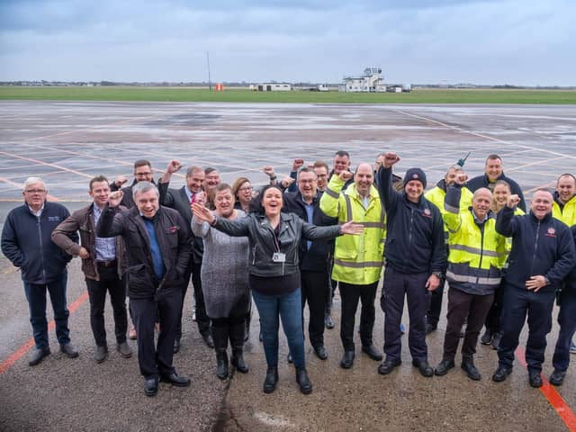Staff at Blackpool Airport celebrate the handing over of the operating licences to Blackpool Airport Operations Limited, a wholly-owned subsidiary of Blackpool Council