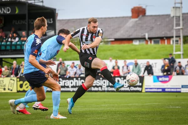 Chorley striker Connor Hall scores against Southport when the two sides met in the FA Cup earlier this season (photo:Stefan Willoughby)