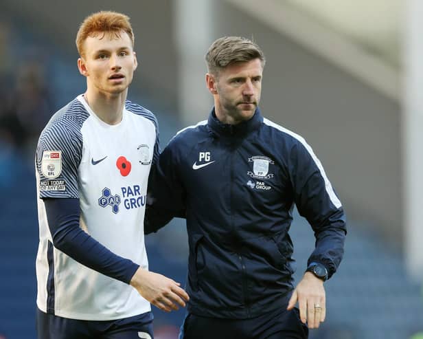 Sepp van den Berg pictured with coach Paul Gallagher