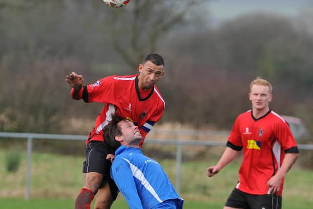 Jordan heads the ball for Longridge Town FC