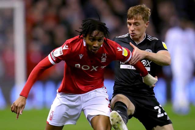 Forest’s Djed Spence (left) and Sheffield United’s Ben Osborn battle for the ball in Tuesday night’s 1-1 draw