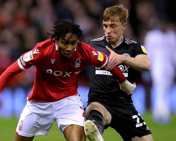 Forest’s Djed Spence (left) and Sheffield United’s Ben Osborn battle for the ball in Tuesday night’s 1-1 draw