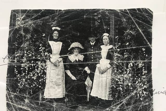 Mrs Agnes Sharples, pictured with her maid, housekeeper and gardener circa 1920. (l-r). housekeeper Thirza Kay, chauffeur Fred Brown and maid Alice Brown. The maid and housekeeper lived in rooms in the attic at Dardsley.