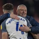 Preston boss Frankie McAvoy embraces goalscorer Ben Whiteman after the win over Bournemouth