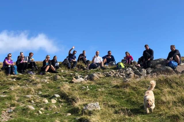 Fifteen colleagues from Preston's Key Group have raised £5000 for Alzheimer's Society by doing a sponsored hike.