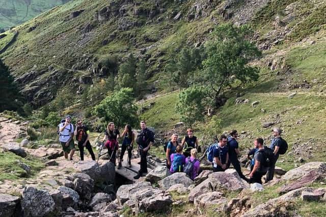 The team climbed the Langdale Pikes in the Lake District, which had an ascent the equivalent to 244 staircases.