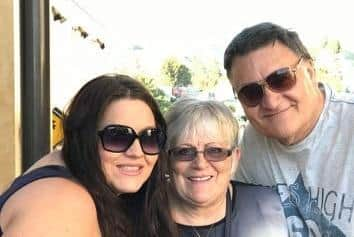 Donna with her parents, Danny and Carole