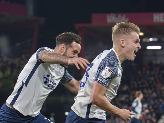 Ali McCann celebrates scoring Preston North End's winner against Bournemouth, pursued by Greg Cunningham
