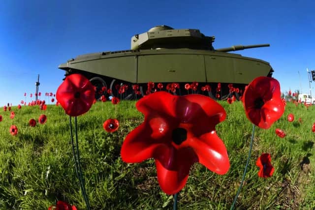 Leyland's famous Centurion Tank on a roundabout near the town has a carpet of poppies to honour our war heroes.