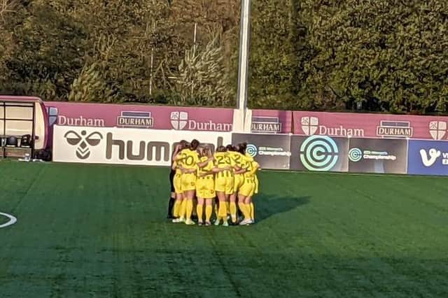 Fylde Women's team huddle in Durham ahead of the cup clash