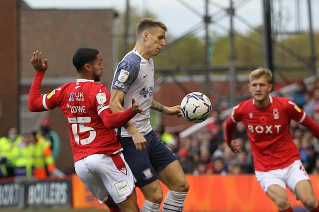 PNE striker Emil Riis controls the ball under pressure from Nottingham Forest's Max Lowe