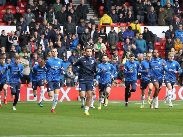 Preston north End players warm-up before the defeat to Nottingham Forest at the City Ground