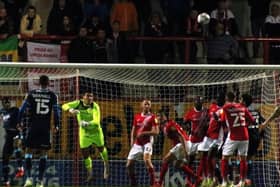 Morecambe keeper Kyle Letheren was injured in the pre-match warm-up