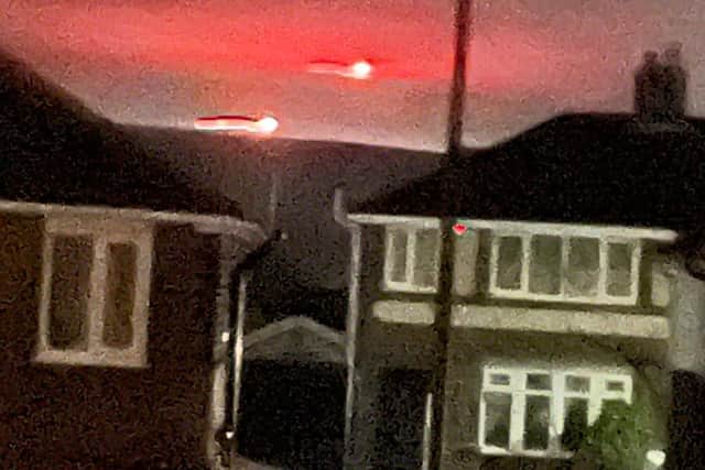 The bright red flashes were spotted in the sky over Winter Hill between 9pm and 11pm last night (Wednesday, November 10), with some people reporting the fiery balls of light to police. Pic: Kane Holden