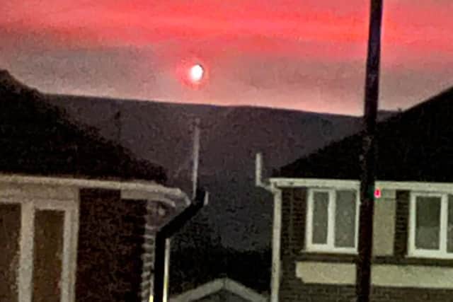 Many people recognised the red flashes as most likely flares and feared that it was a distress signal from someone in need of help on the wild moors of Winter Hill. Pic: Kane Holden