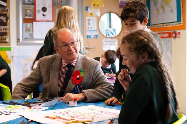 Col David Waters, President of Preston and District Veterans Council, speaks to pupils