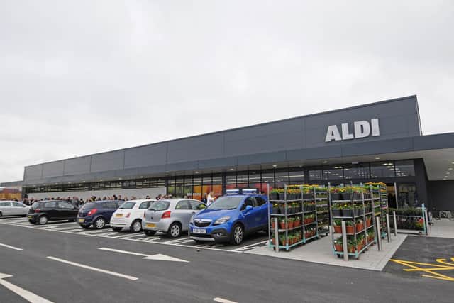 Shoppers queueing at the opening of the Queen’s Retail Park Aldi store in Preston