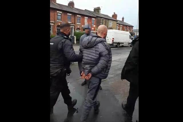 The 28-year-old being led to a police van following his arrest on suspicion of burglary and possession of a knife in Tulketh Brow, Preston on Friday, November 12. Pic: Matt Rivers