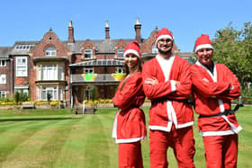Caludia, Henry and Ian Pearson are taking part in the St Catherine's Hospice Santa dash this year after their family was helped by the hospice