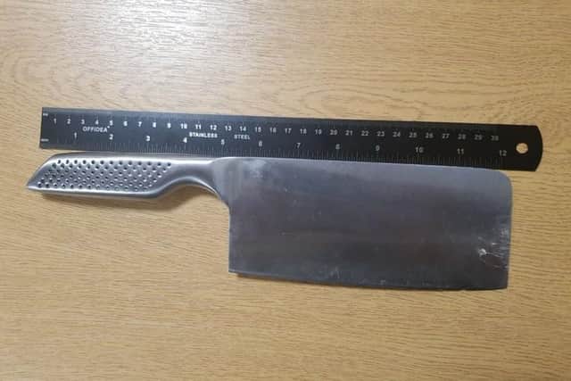 A meat cleaver was recovered after a man was stopped by police in Preston city centre (Credit: Lancashire Police)