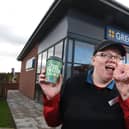Greggs manager who has been with the chain for eight years outside the new premises in Chorley.