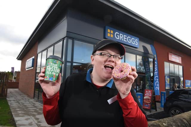 Greggs manager who has been with the chain for eight years outside the new premises in Chorley.
