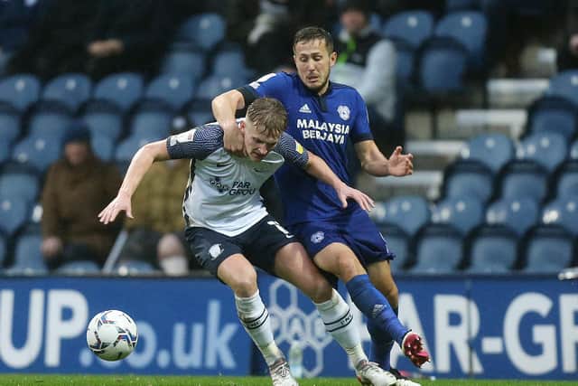 North End midfielder Ali McCann battles for the ball with Cardiff's Will Vaulks