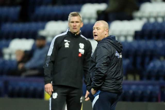 Preston North End head coach Frankie McAvoy on the touchline with Cardiff's Steve Morison