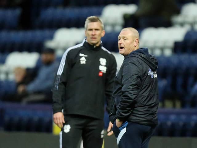 Preston North End head coach Frankie McAvoy on the touchline with Cardiff's Steve Morison