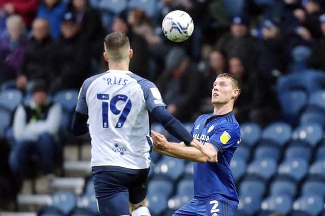 Cardiff City’s Mark McGuinness under pressure from Emil Riis