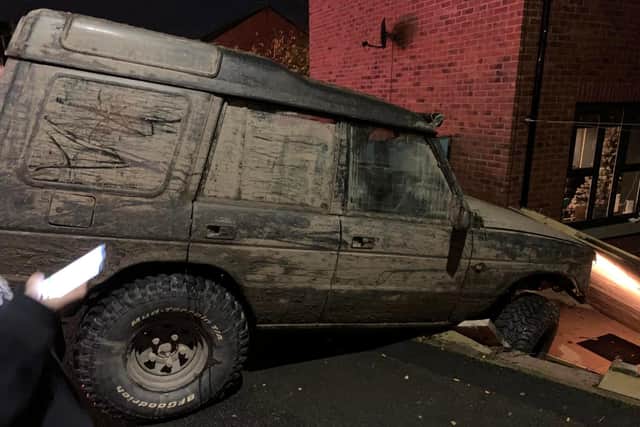 The green Land Rover Discovery was seen driving erratically around Ashton last Thursday (November 18) before the driver lost control, mounted the pavement near the Wheatsheaf Pub and smashed through a garden fence in Bray Street, close to the junction with Tulketh Brow. Pic credit: Mr Alom