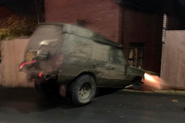 After crashing through fence panels and breaking garden furniture, two young lads sprang out of the mud-splashed Land Rover and were seen running away. Pic credit: Mr Alom
